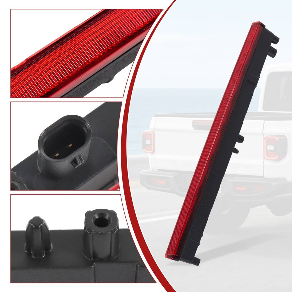 Close-up of red brake light lens with black plastic end caps and mounting tabs