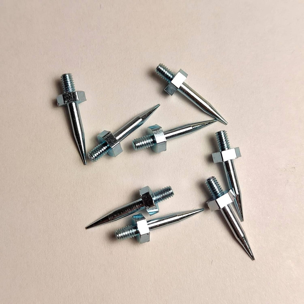 Replacement moisture meter pins with pointed tips and threaded posts, metal set