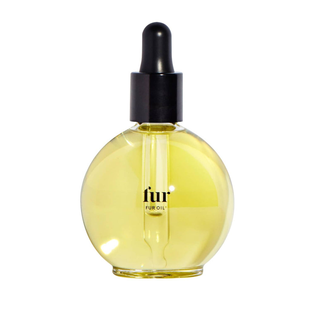 Fur Oil bottle with black dropper and golden amber liquid