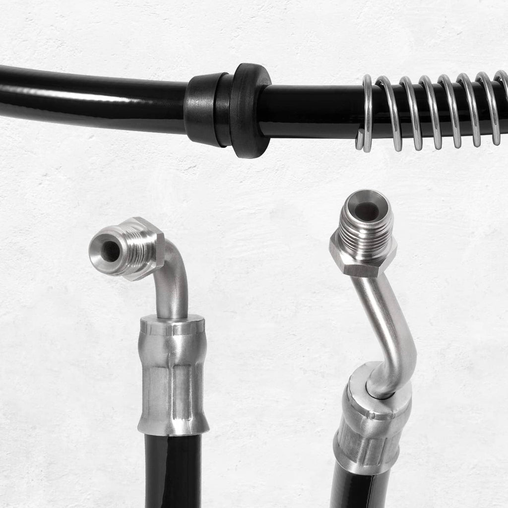 Marine power trim hose close-up of black hose, spring, and silver metal fittings