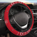 Red steering wheel cover with black border and colorful paisley pattern wrap
