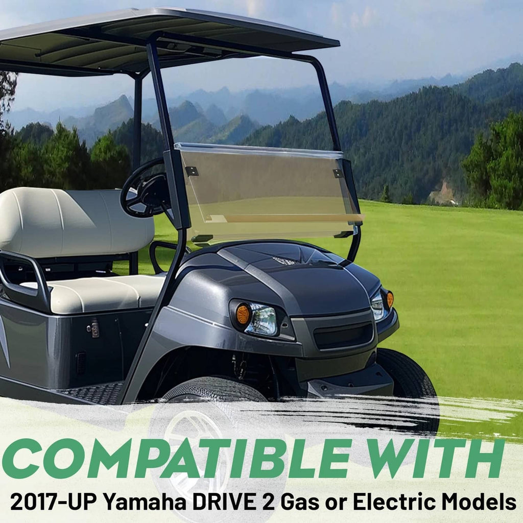 Golf cart front windshield with dark tinted panel and black frame, folded down on driver area