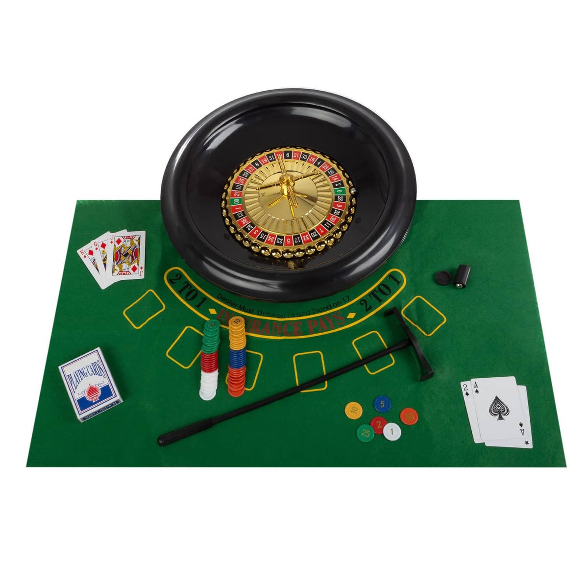 Roulette wheel set with cards, poker chips, and ball rake on green felt mat