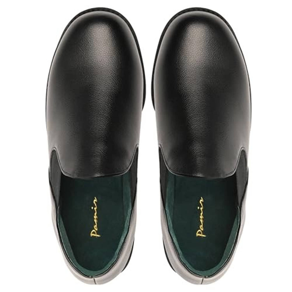 Pair of black leather slip-on slippers with green interior lining, moc-toe style