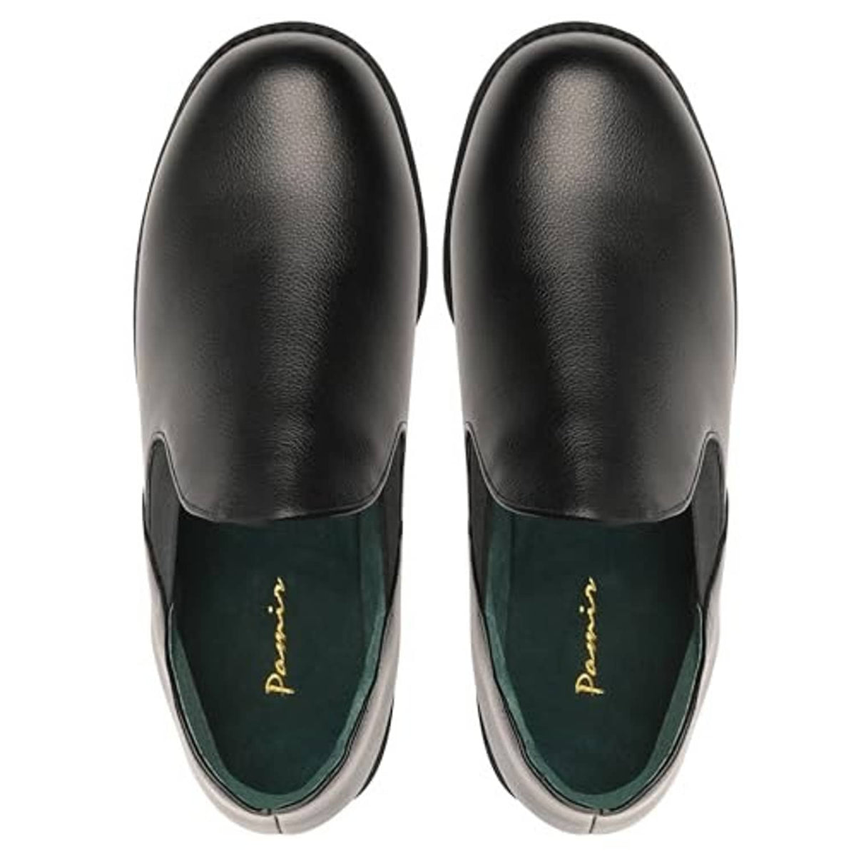 Pair of black leather slip-on slippers with green interior lining, moc-toe style