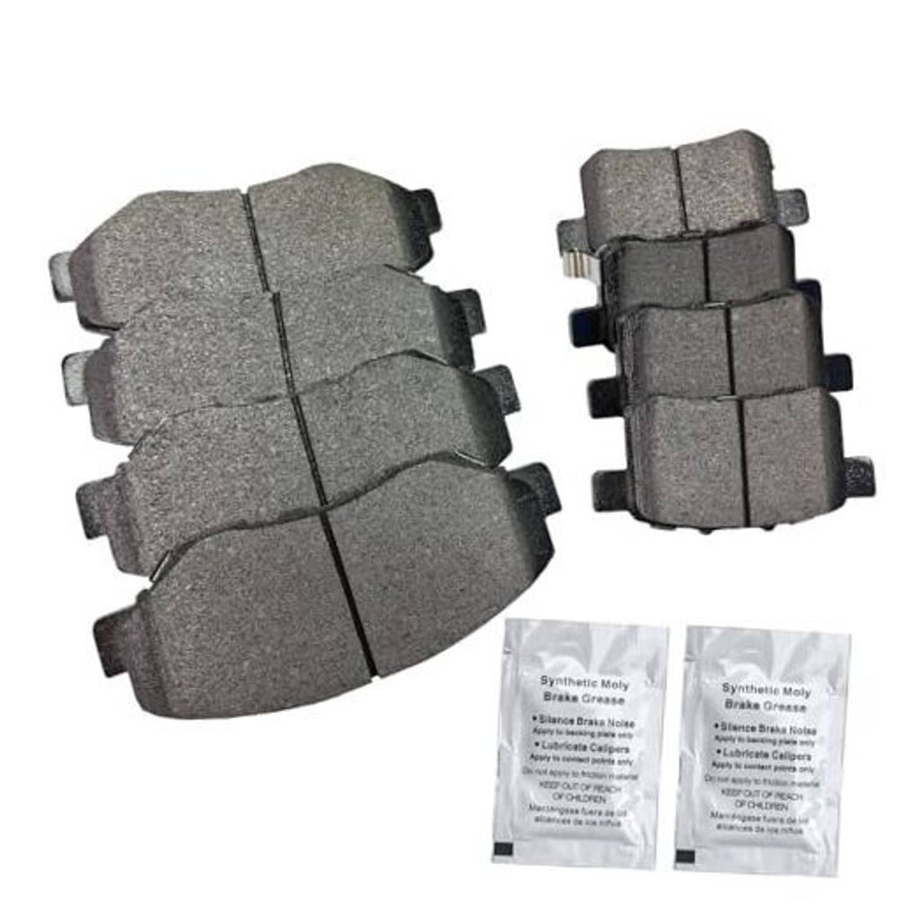 Ceramic disc brake pads set with gray friction surfaces and metal mounting clips