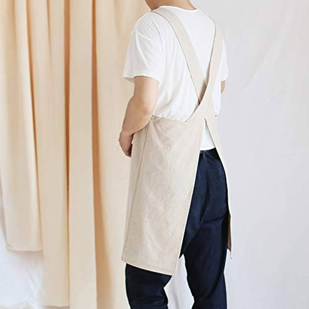 Light beige cooking apron, cross-back design and front patch pocket
