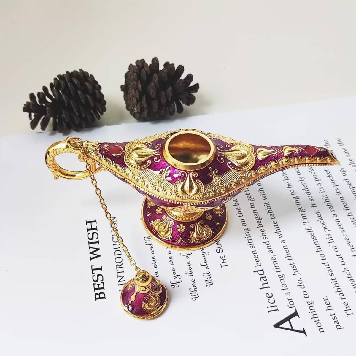Purple and gold genie lamp charm with chain, gold ring, and decorative tassel