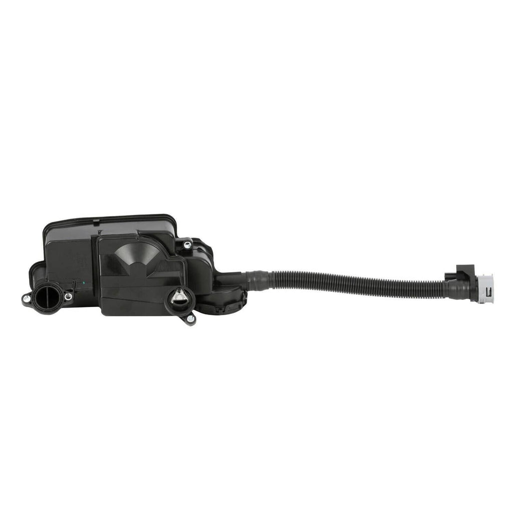 Black oil separator housing with ribbed hose and white connector plug