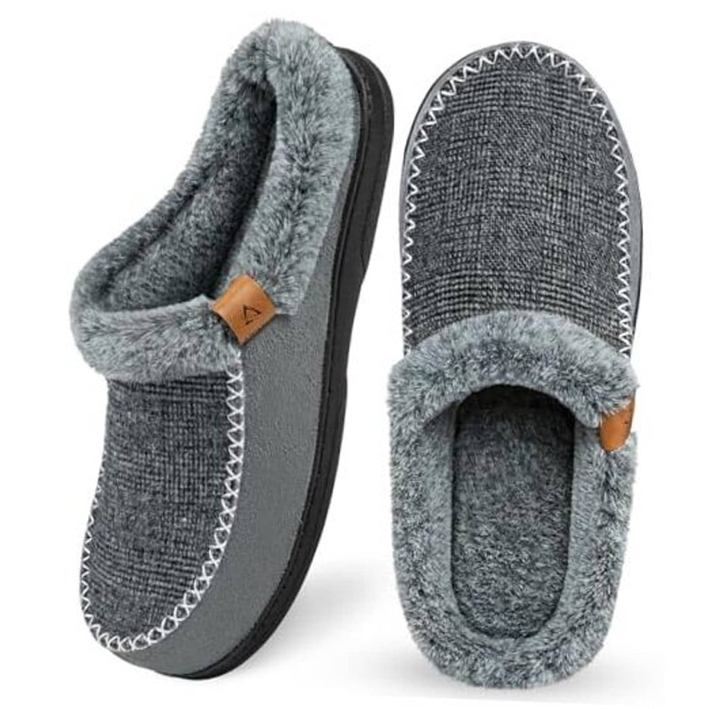 Grey and black slip-on moccasin slippers with fuzzy lining and tan logo patch