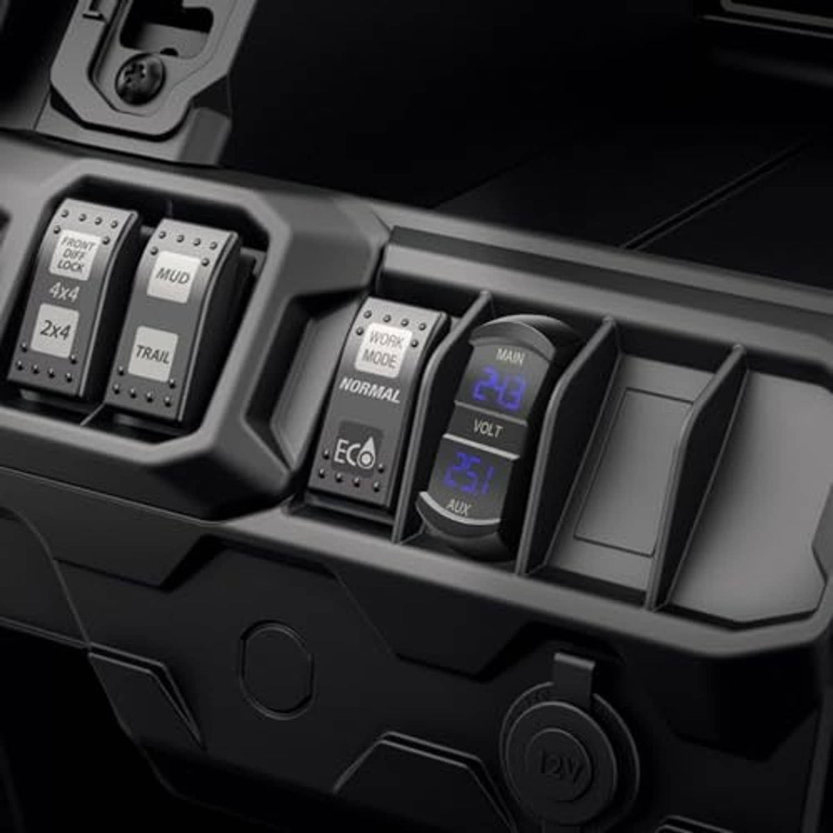 Black dual voltmeter gauge in vehicle console with blue LED MAIN and AUX digits