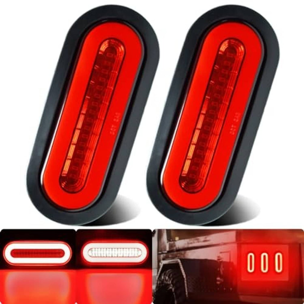 Pair of oval red LED trailer lights with black frames and bright red glow