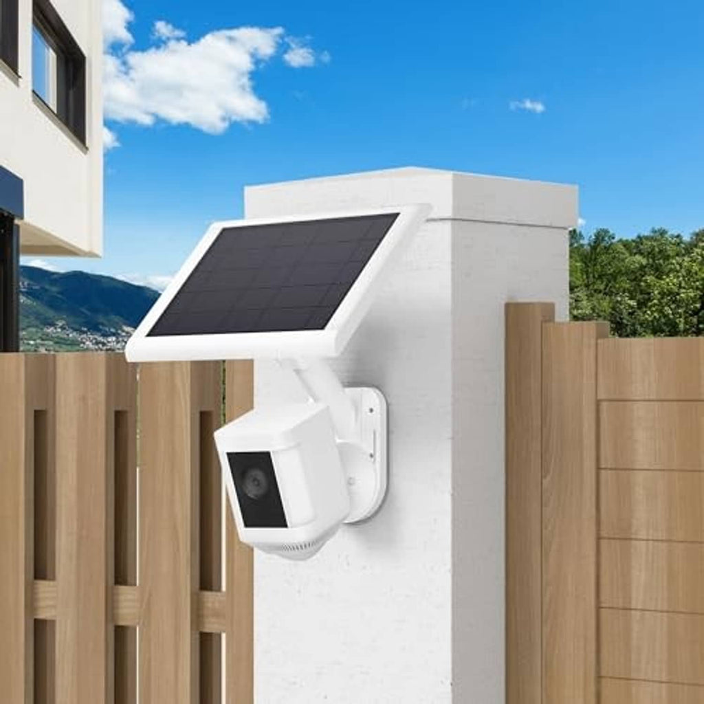 White outdoor wall mount with attached solar panel and security camera