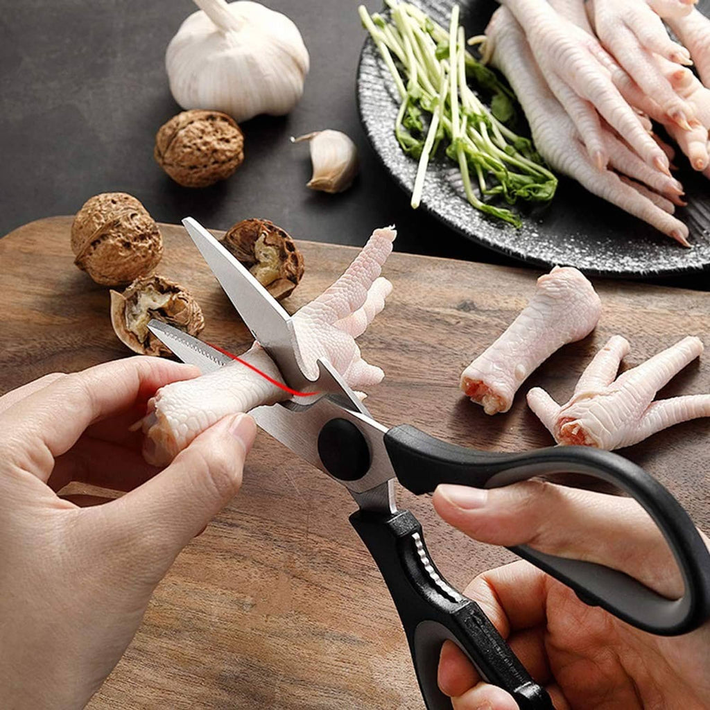 Black kitchen scissors with silicone grip for trimming and handling food safely