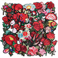 Assorted embroidered flower patches with red, pink, and white roses on black trim