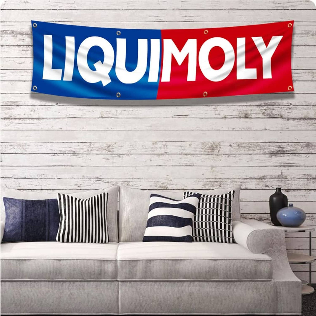 Blue and red Liquid Moly racing banner flag with metal grommets along the edges