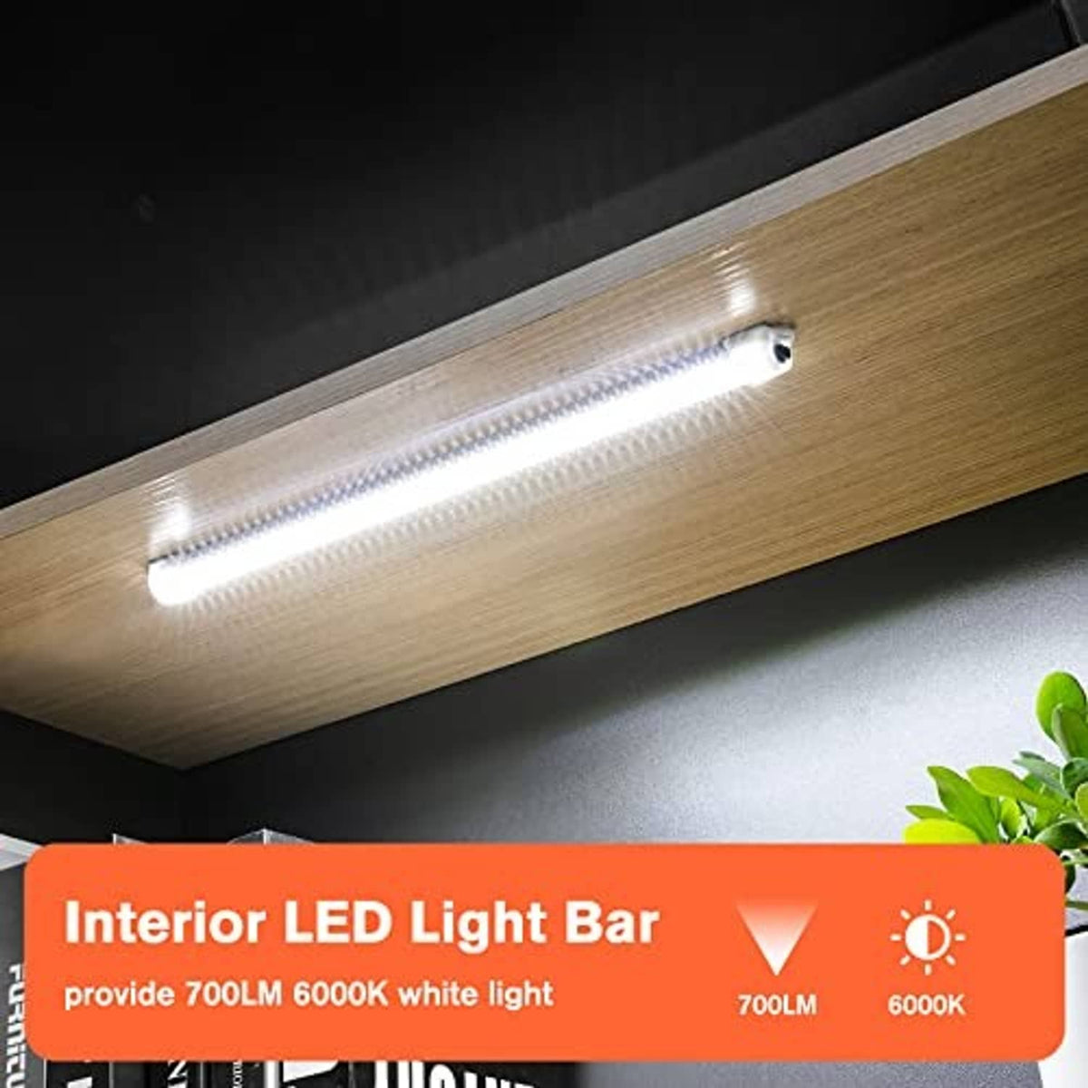 Installed interior LED light bar under a cabinet, emitting bright white light