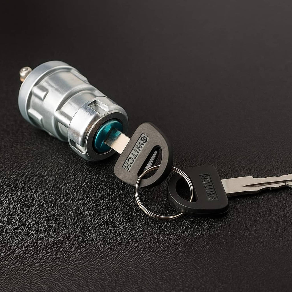 Ignition key switch with two keys on silver metal cylinder, blue insert