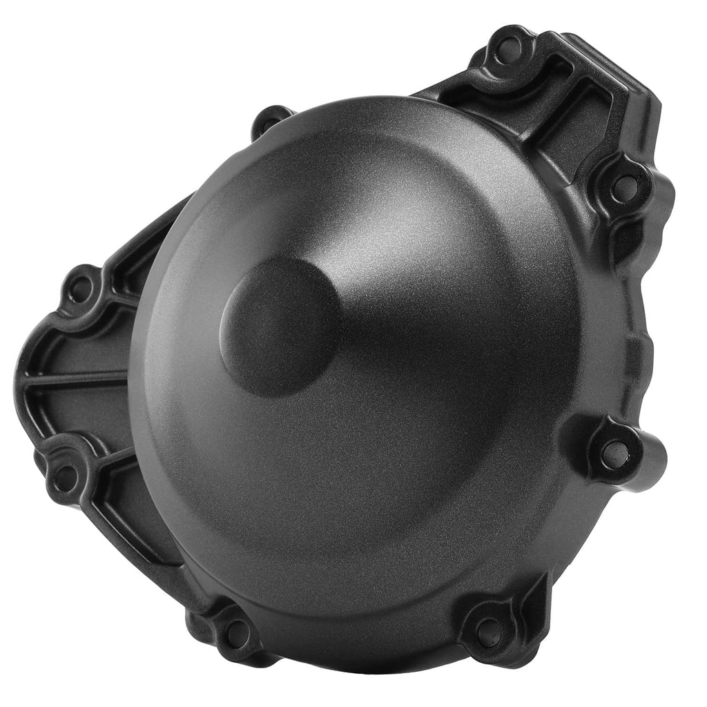 Left side engine stator cover, angled view of black housing and round cap
