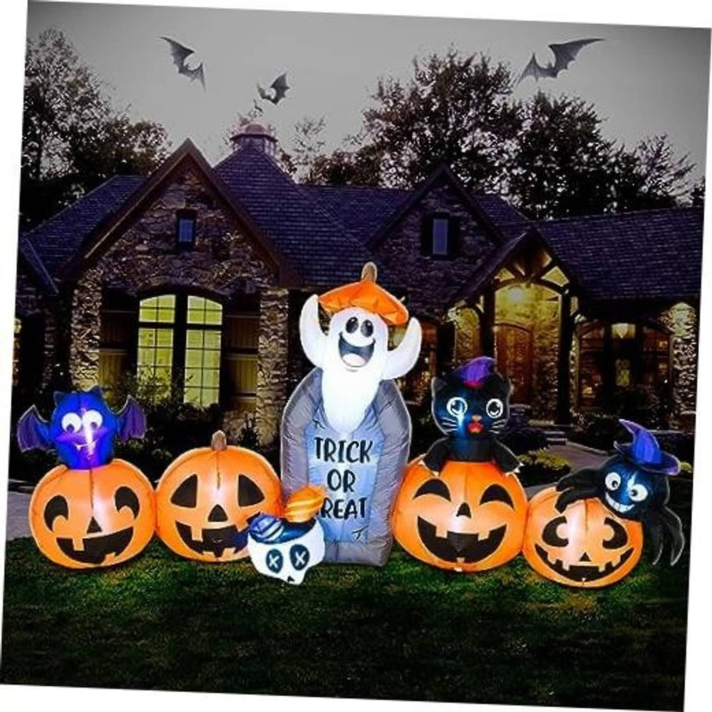 Halloween inflatable decoration set with smiling ghost, black cat, and jack-o'-lantern pumpkins