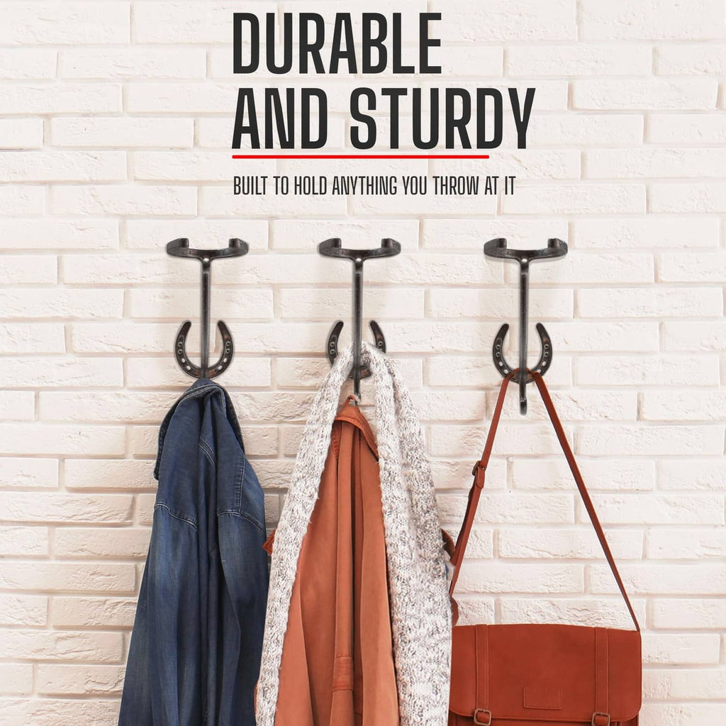 Wall-mounted cowboy hat rack with U-shaped hooks holding hats and bags.