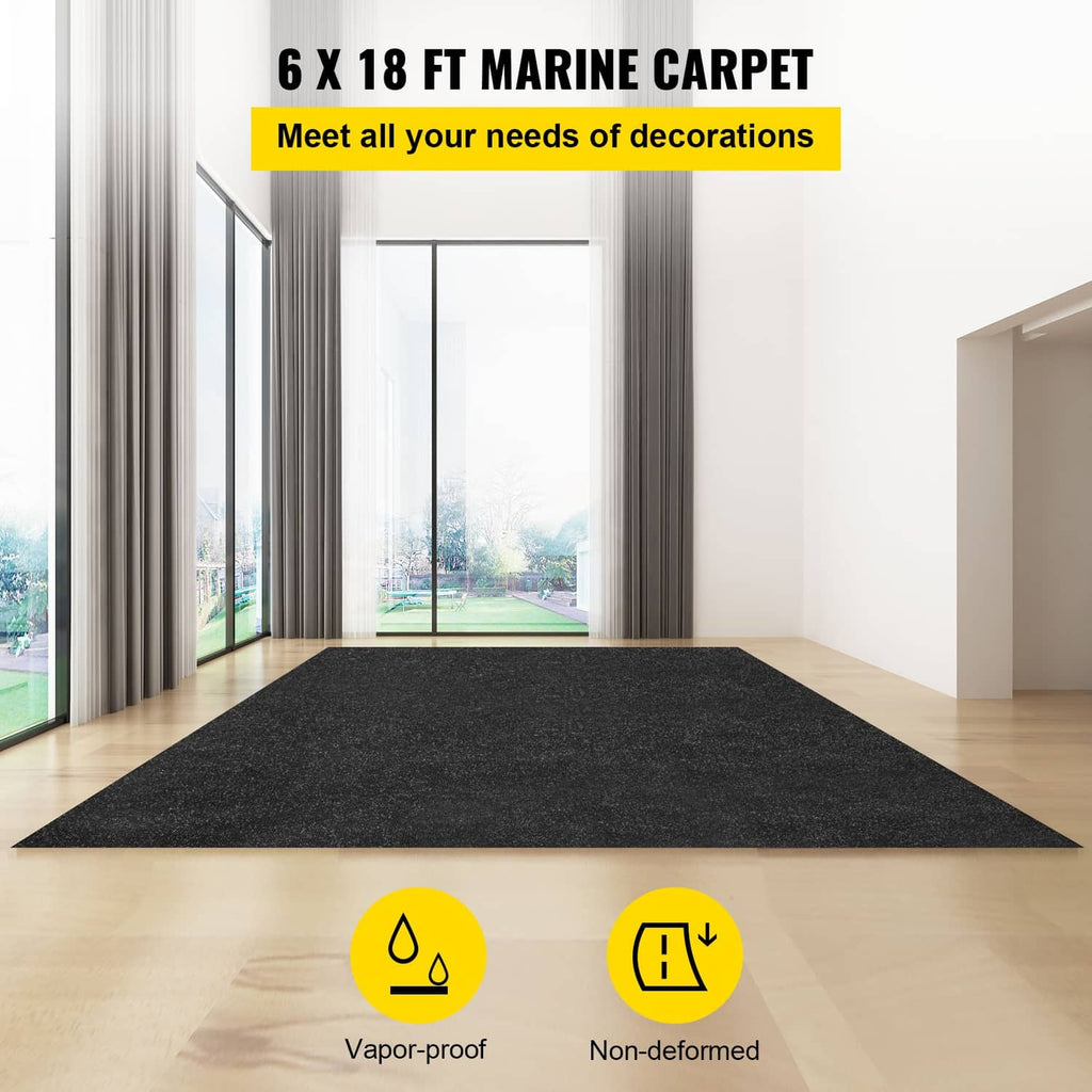 Charcoal black marine carpet mat on indoor floor, flat surface with speckled pile