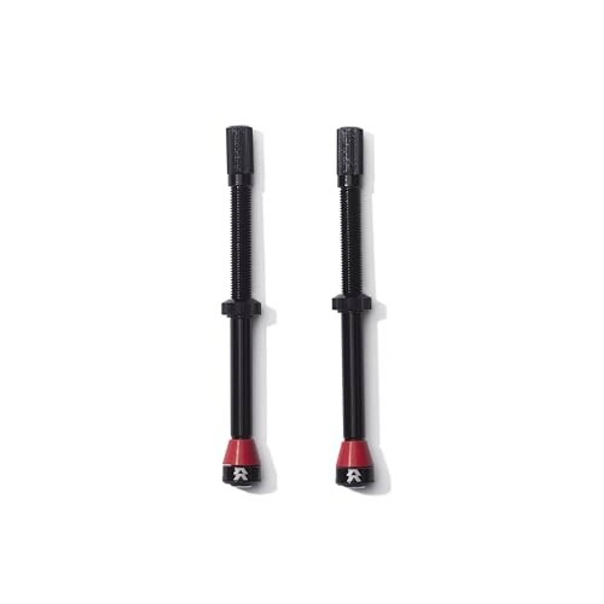Two black 90mm tubeless bike valve stems with red base tips