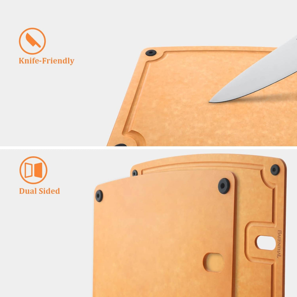 Tan composite dual-sided cutting board with handle slot and corner grip holes