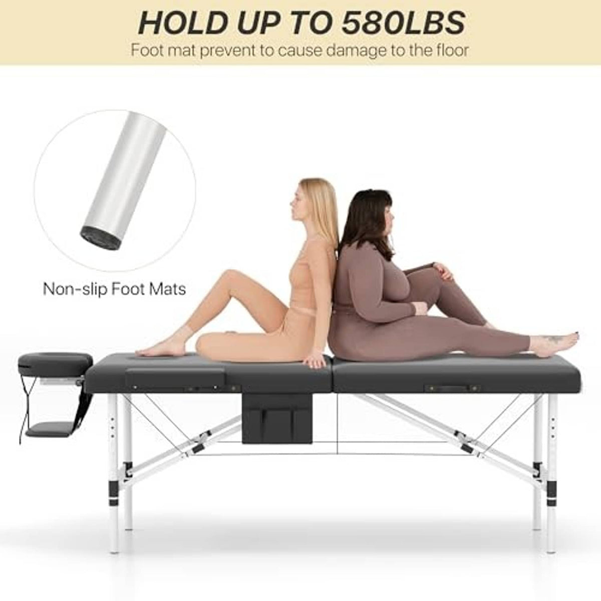 Portable massage table supporting two people, with black cushions and head/arm supports
