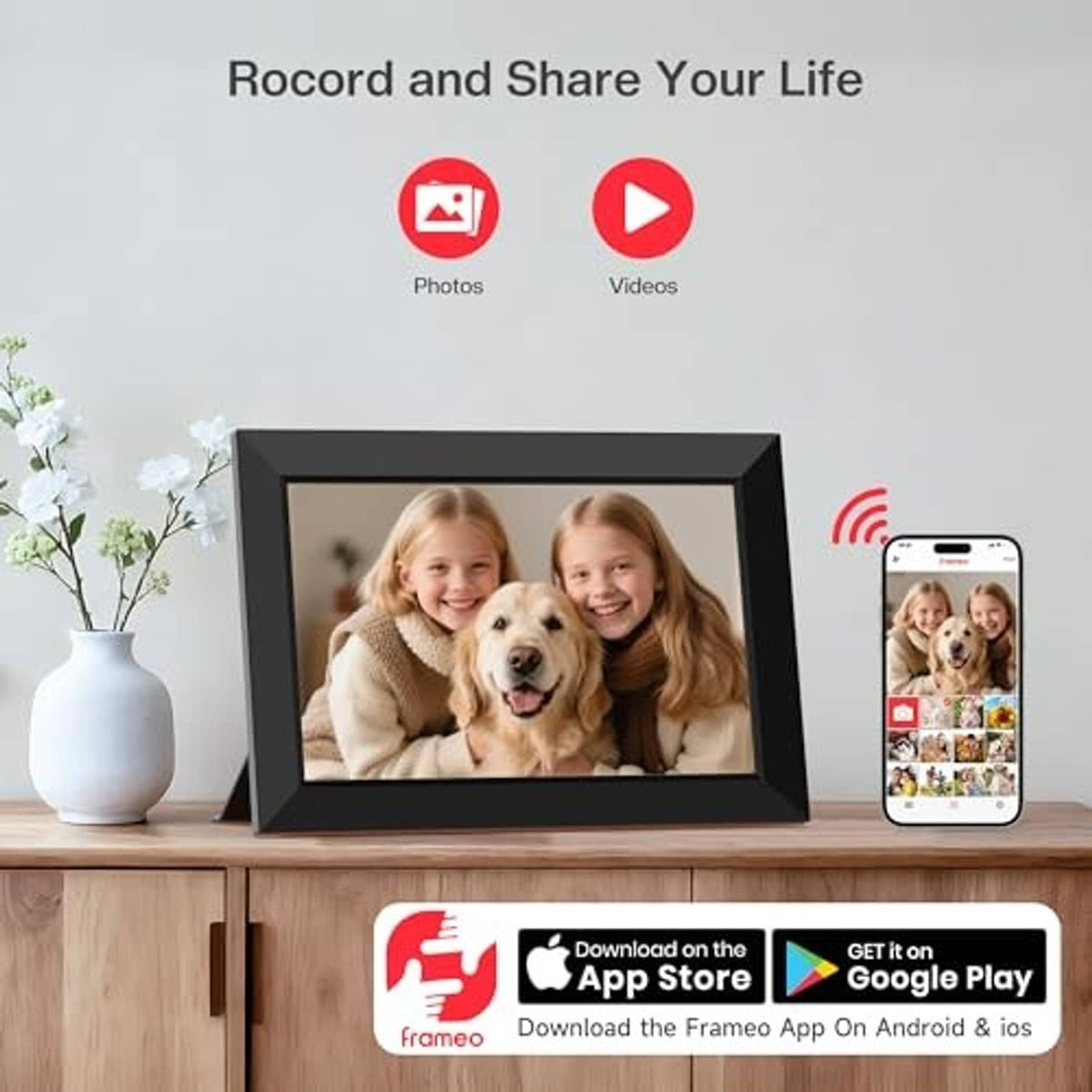 Black digital picture frame showing photo of two kids and a dog