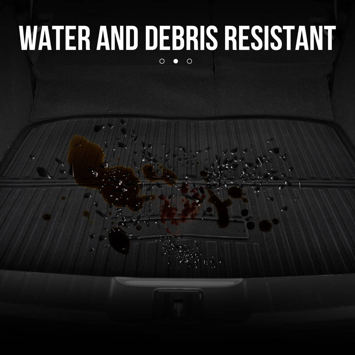 Black floor mat with water droplets on raised ridges for debris resistance