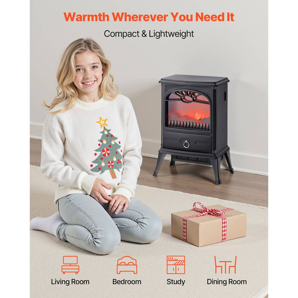 Black freestanding electric fireplace heater beside a gift box, with flame window view