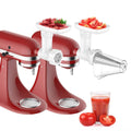 White fruit and vegetable strainer attachment with mesh barrel and food bowl on mixer