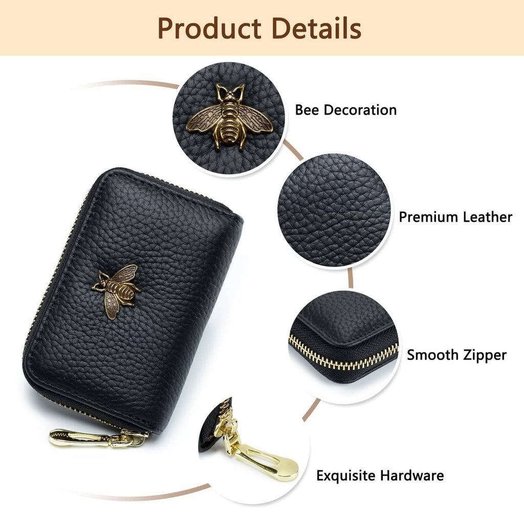Small black leather zipper card case with gold bee charm and detailed smooth zipper