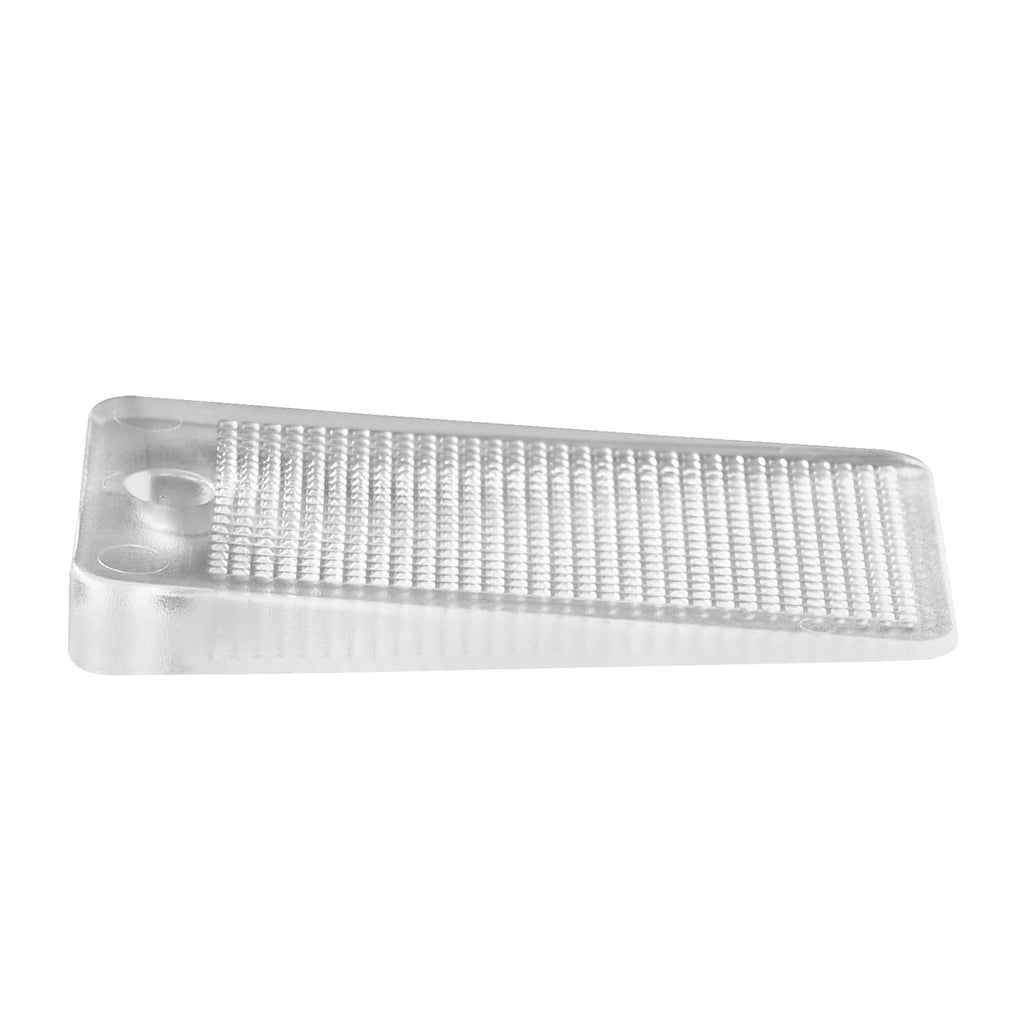 Transparent rectangular leveling shim with raised textured grid and oval cutout.