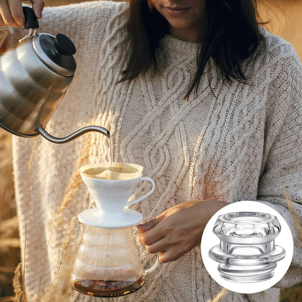 Person pouring coffee using a percolator, with a metal and glass replacement top inset
