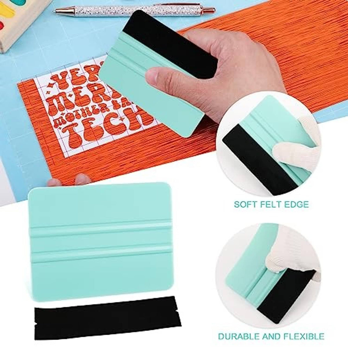Hand using teal and pink vinyl squeegees with black felt edges on a decal