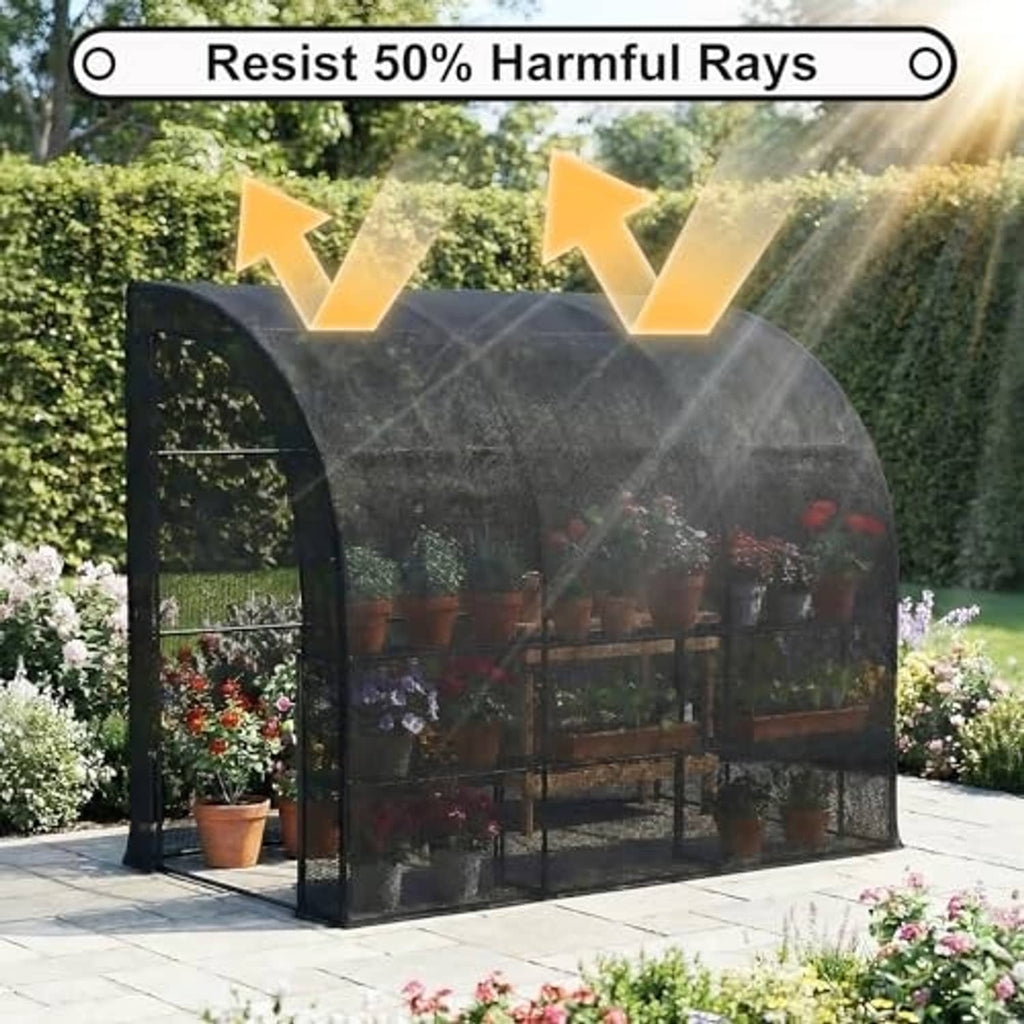 Dark gray shade mesh screen draped over a garden enclosure frame