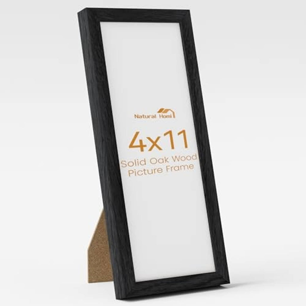 Black 4x11 solid oak photo frame with clear front glass, angled display view