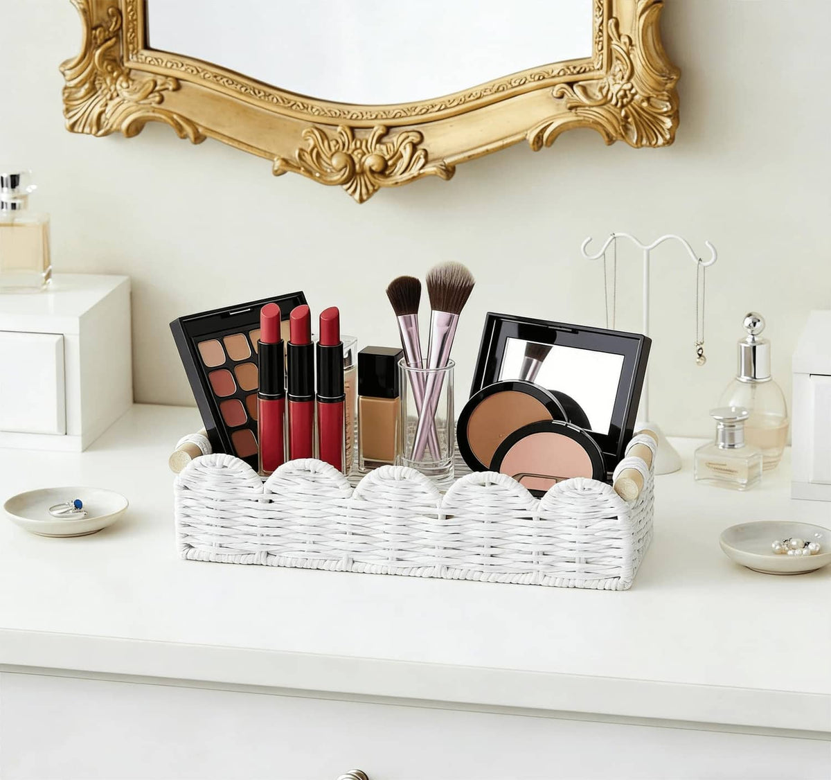 White woven makeup organizer basket with rope handles on a vanity counter