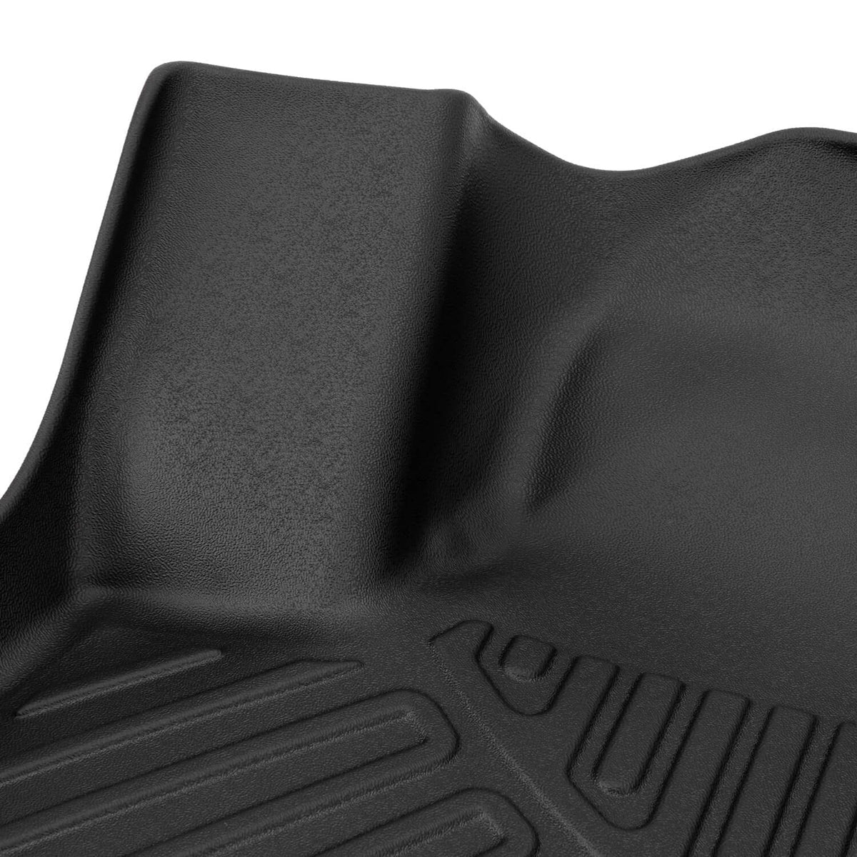 Black molded TPE rubber floor mat with raised ridges and textured grip
