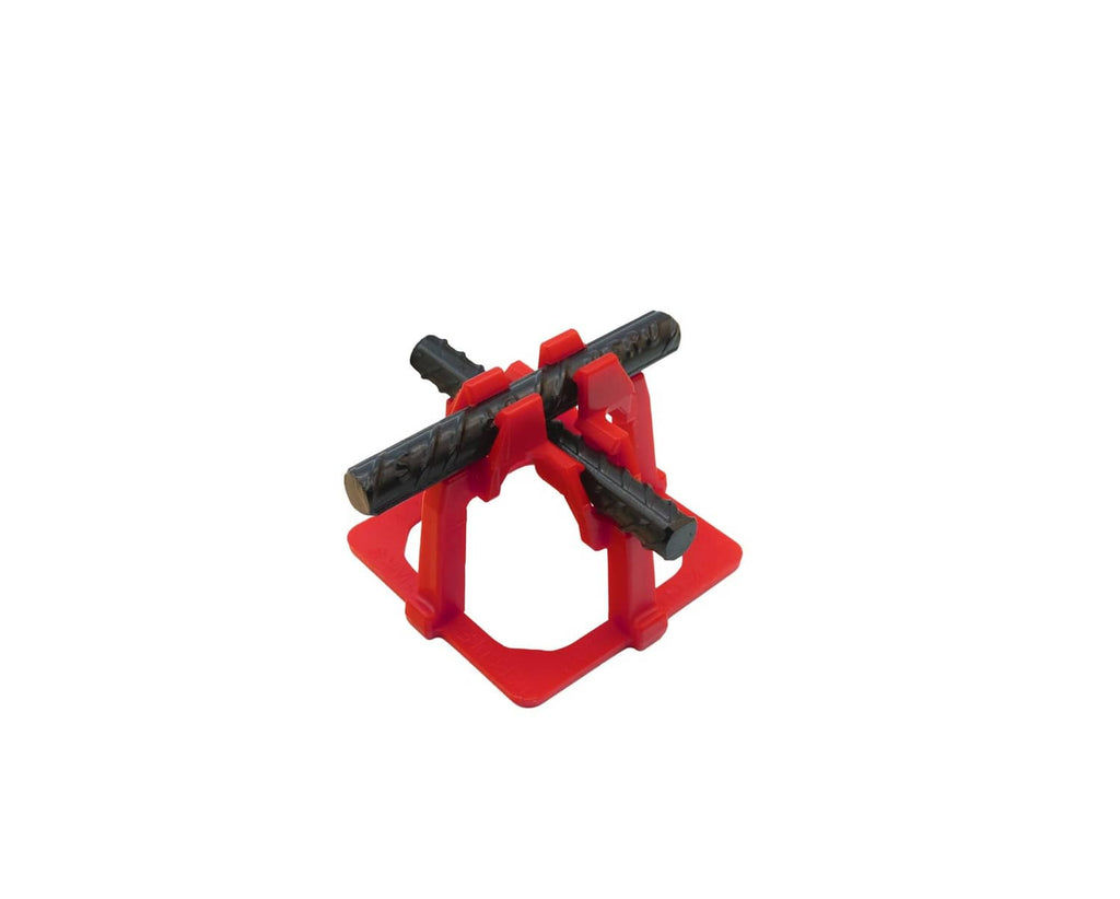 Red plastic rebar chair spacer holding two black metal rebar rods