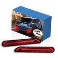 Red LED rear bumper reflector light with ribbed grid lens and curved housing.
