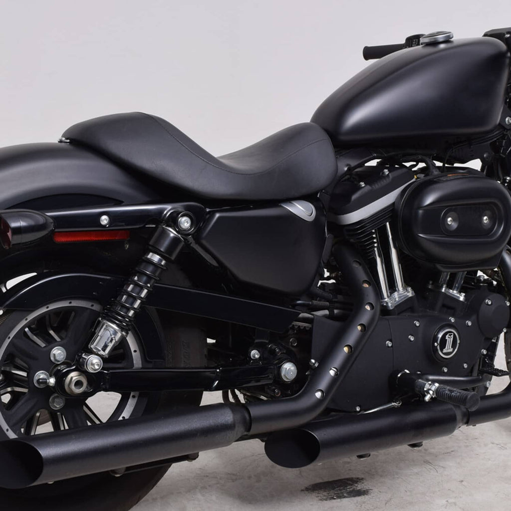 Black solo motorcycle seat with contoured cushion and stitched seam, mounted on a bike