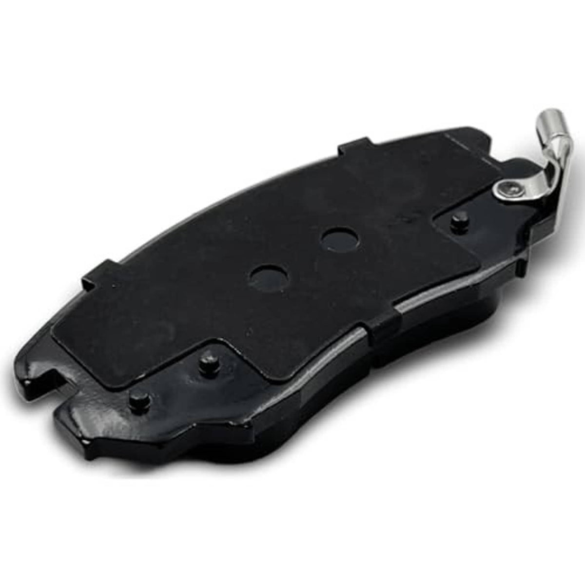 Ceramic brake pad back side, black backing with mounting slots and two screw holes