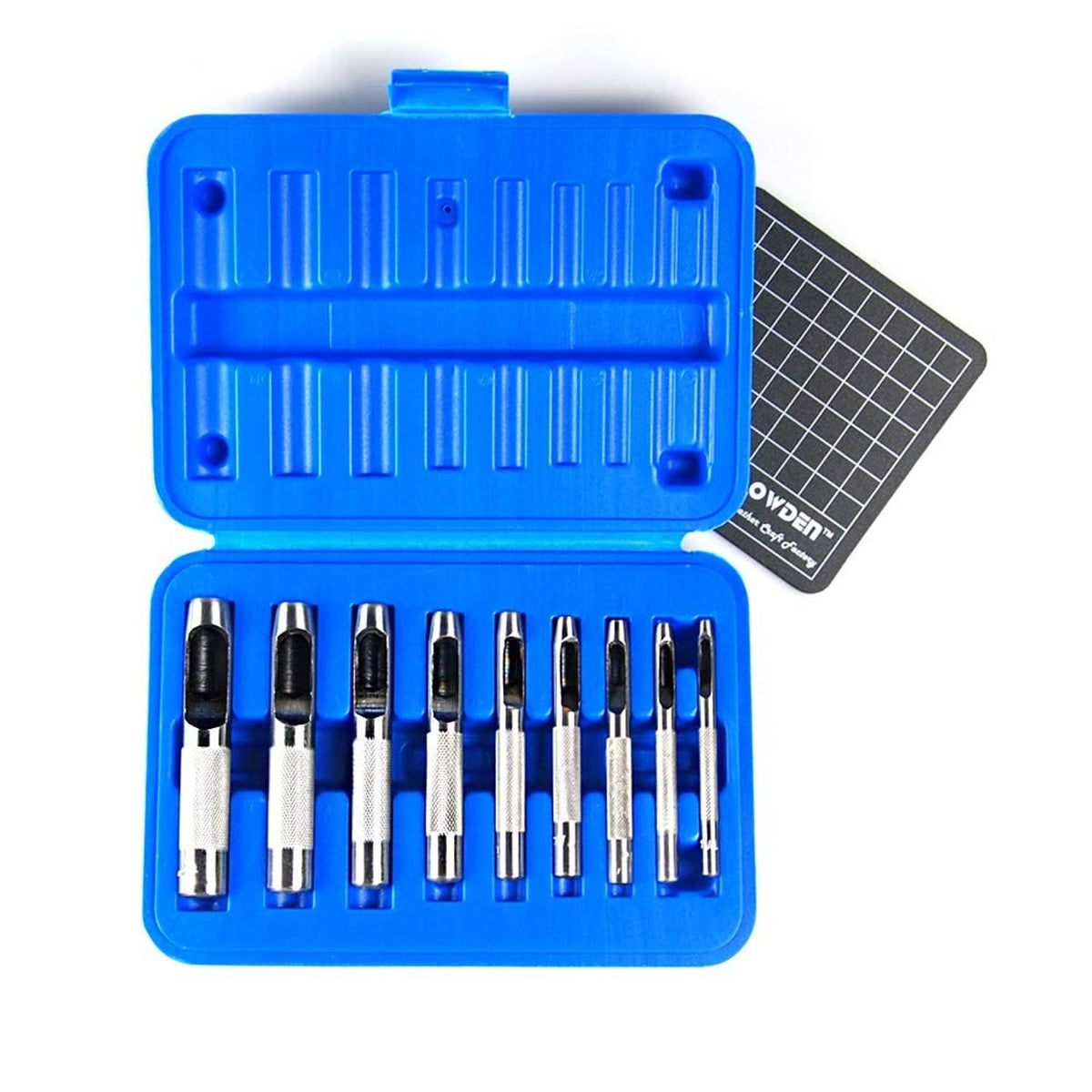 Hollow punch set in open blue case with grid cutting mat and silver punches