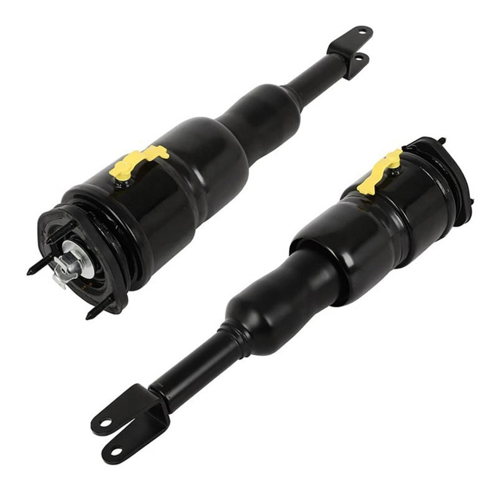 Front air suspension shock strut pair, black cylinders with yellow caps and fork-style brackets