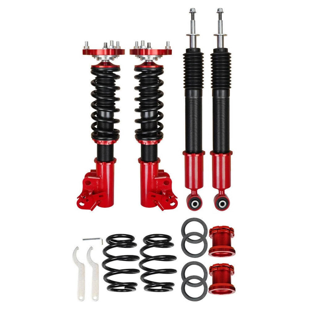Coilover suspension kit bundle with four struts, black springs, and rubber seals