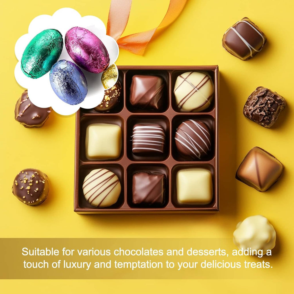 Assorted foil-wrapped candies with chocolates in an open box