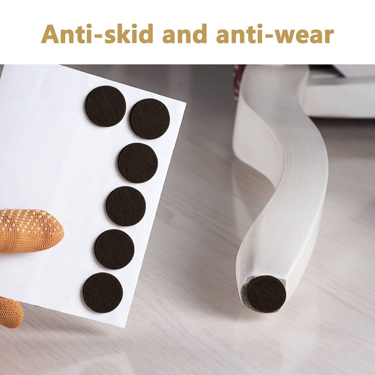 Black self-adhesive anti-slip pads, round pieces applied under furniture